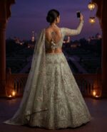 Presenting New Heavy Embroidery work Designer Soft Net Lahenga Collection - Image 11